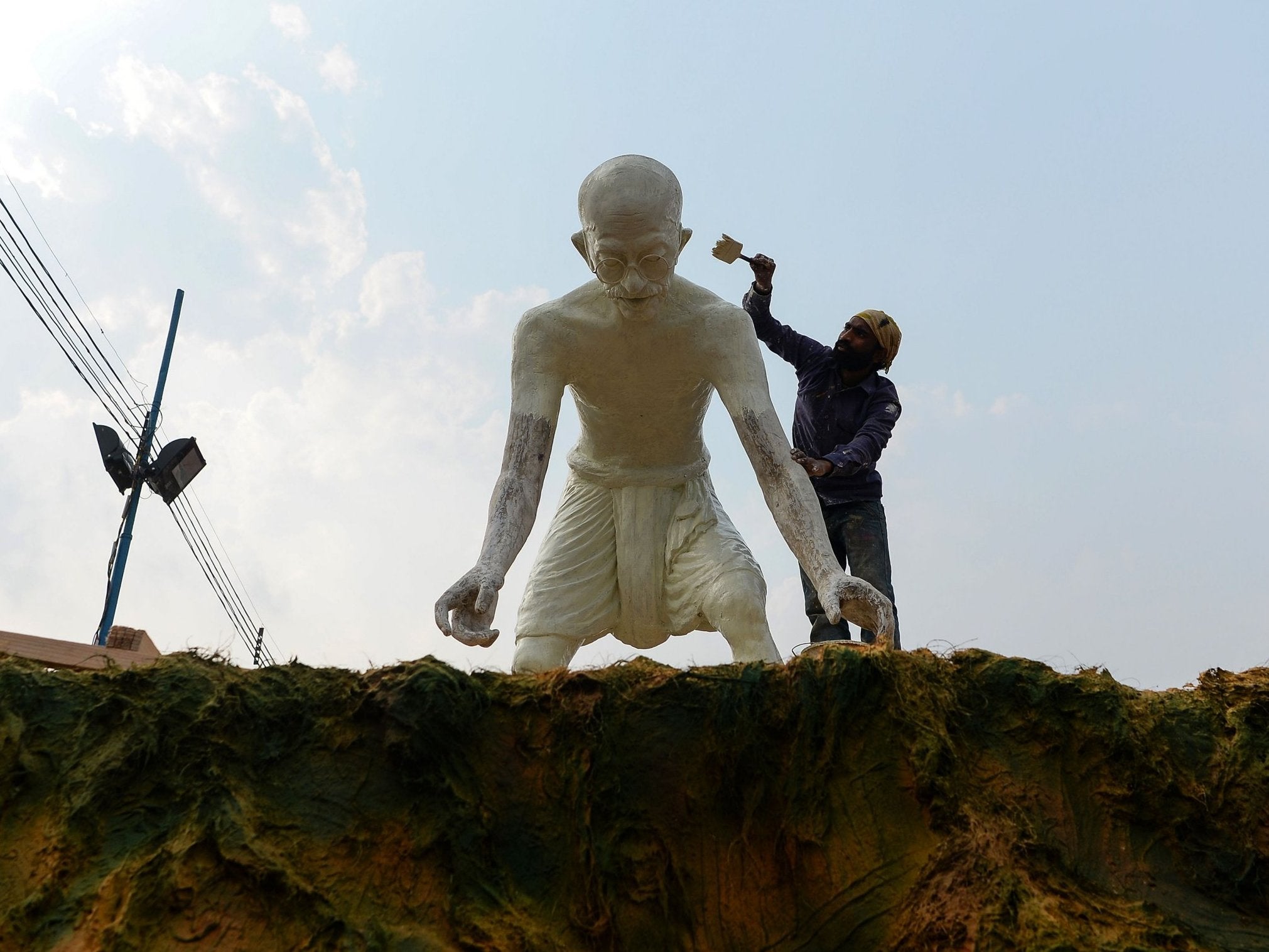 A statue of Gandhi being painted for a float for 2019’s Republic Day parade in New Delhi