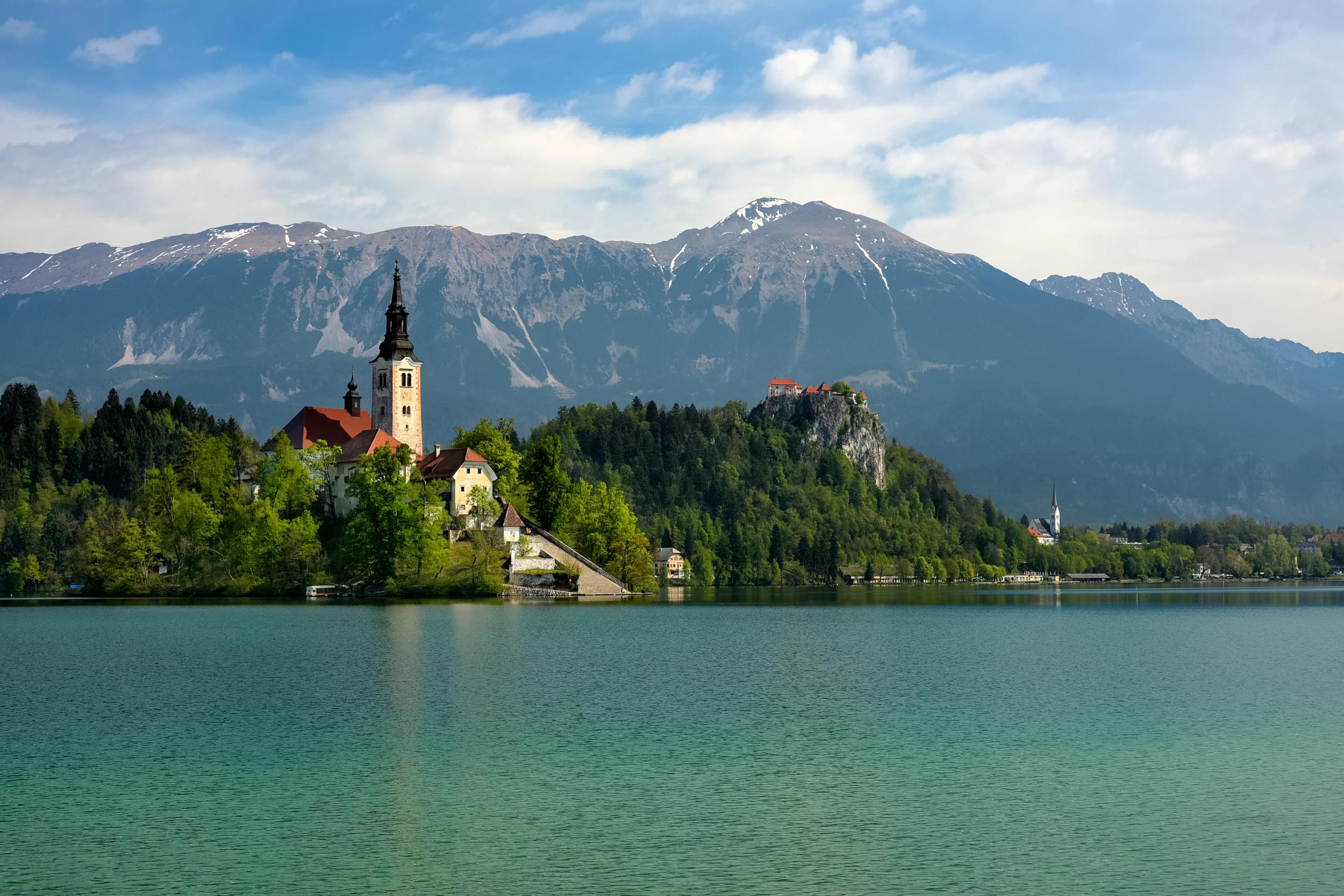 The backdrop of the Julian Alps adds to the romance of Lake Bled