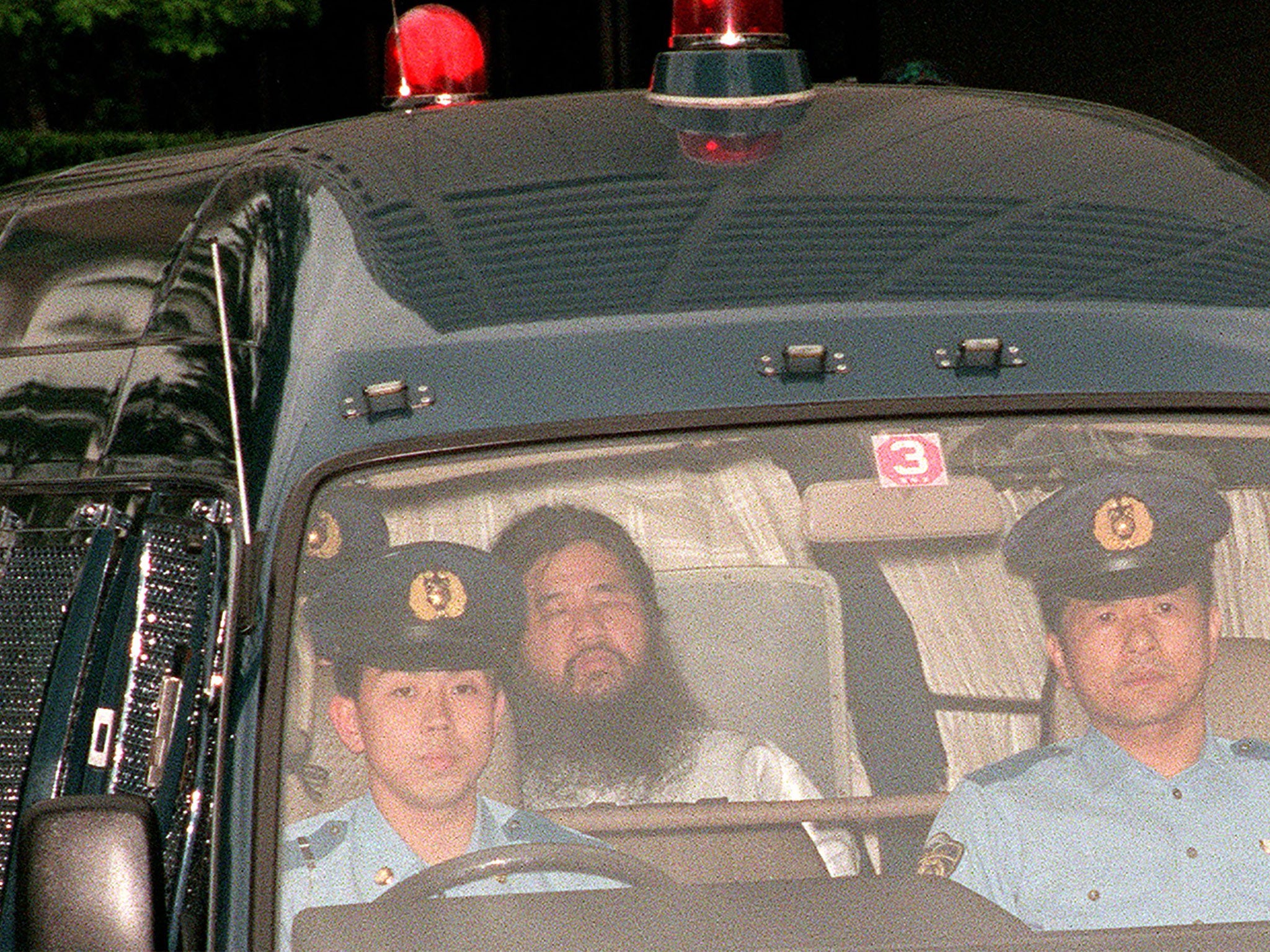 Shoko Asahara in police custody