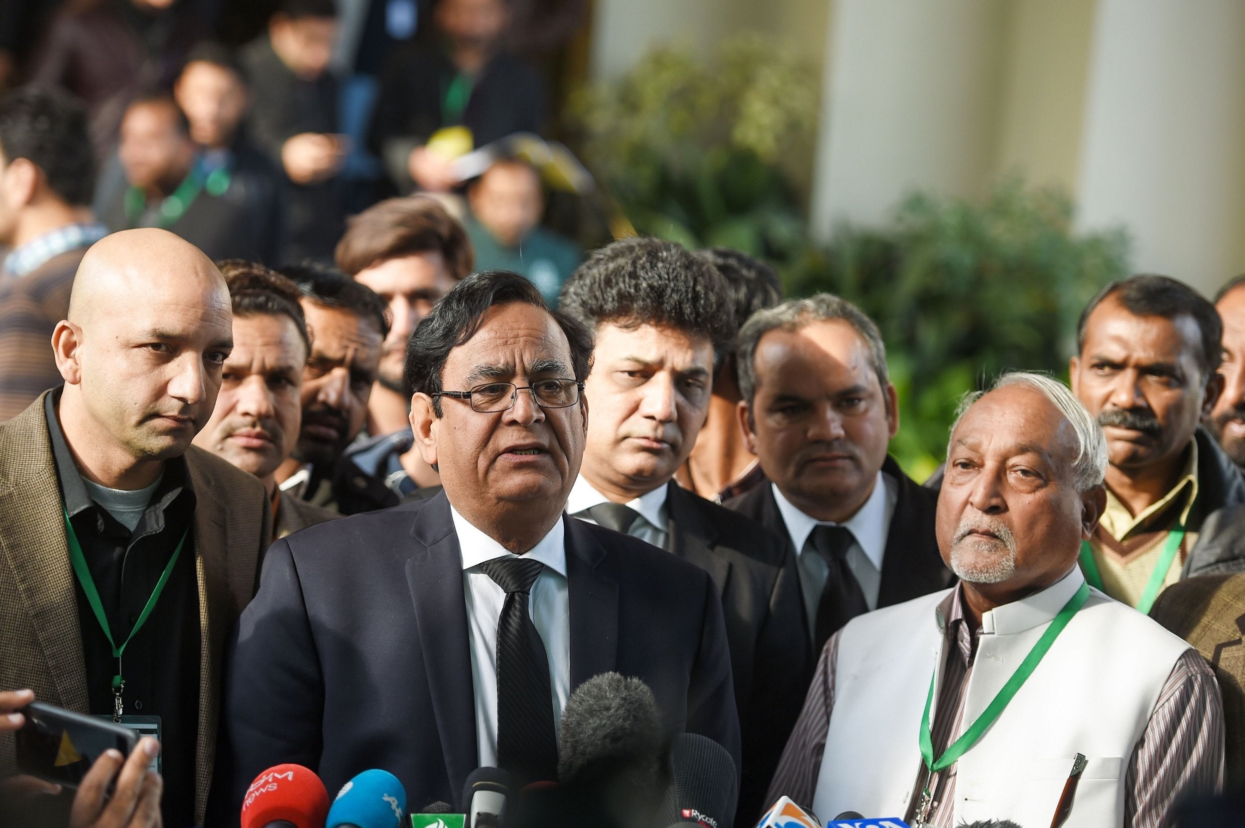 <p>FILE: Saif-ul-Mulook (C), the lawyer of Pakistani Christian Asia Bibi, speaks to the media outside the Supreme Court building in Islamabad on 29 January 2019. An eight-year-old boy has been charged with blasphemy in Pakistan</p>