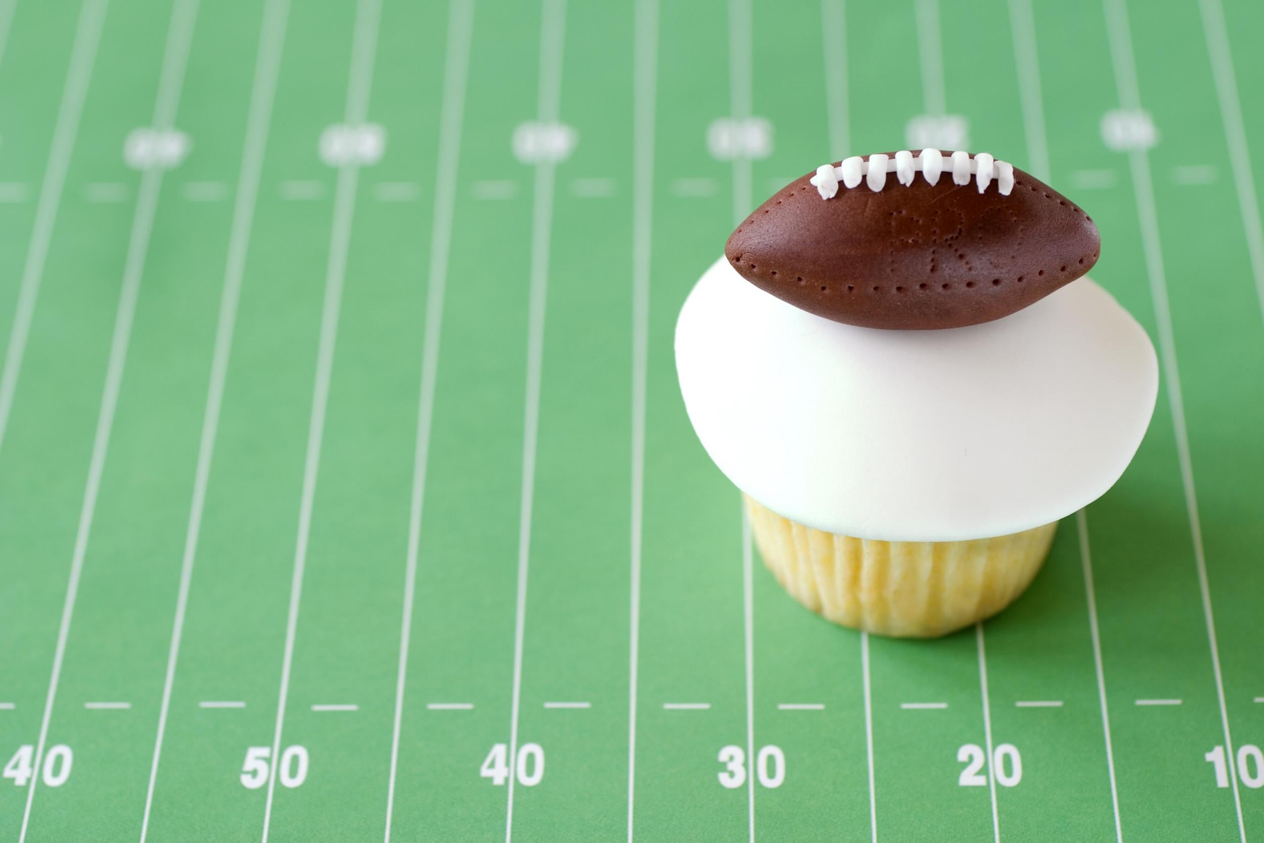 Cupcakes decorated with footballs are perfect for dessert on Super Bowl Sunday