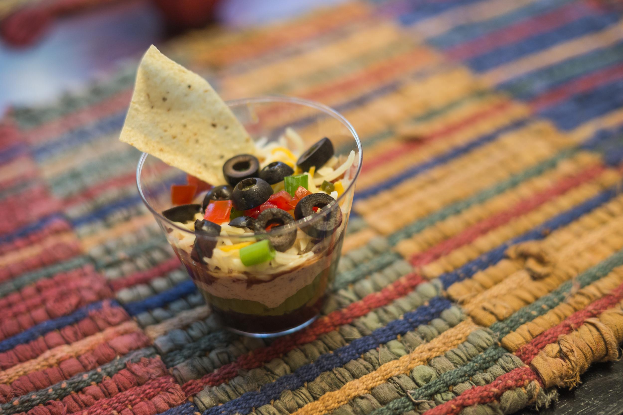You can serve individual cups of seven-layer dip