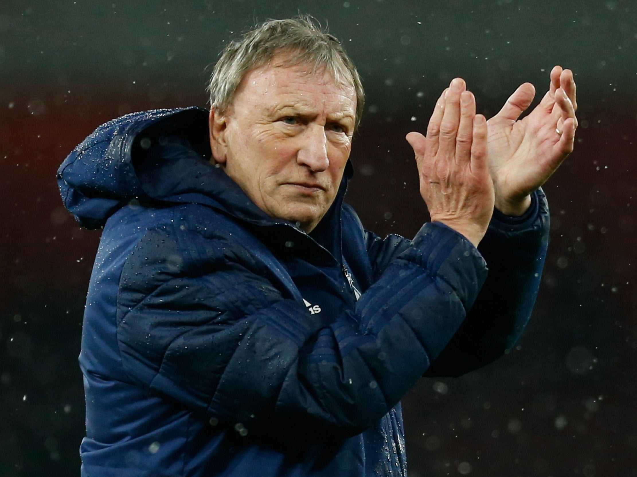 Neil Warnock applauds the Cardiff fans