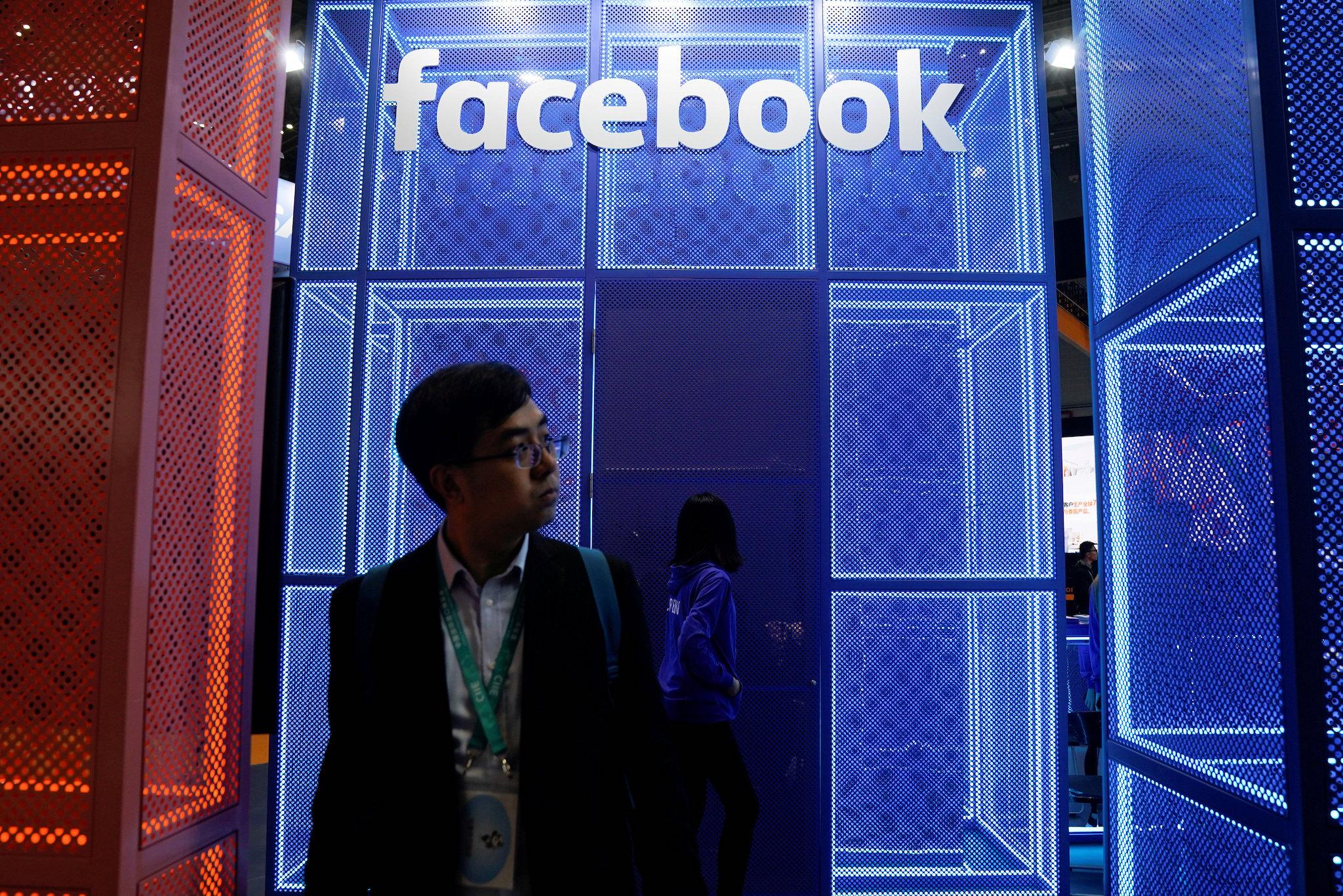 A Facebook sign is seen during the China International Import Expo (CIIE), at the National Exhibition and Convention Center in Shanghai