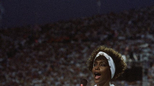 1991 - Whitney Houston
<br><br>
For her rendition of the Star Spangled Banner at the Super Bowl Whitney Houston wore a white tracksuit with red Nike trainers and her hair held back by a headband