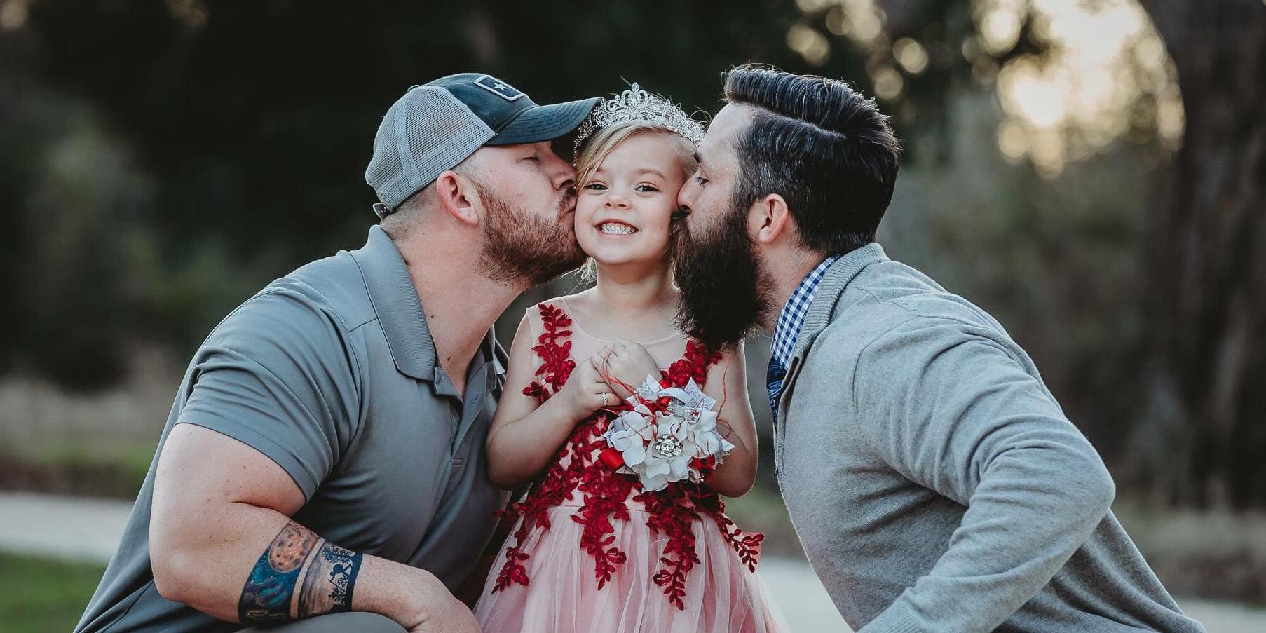 Young Girl Poses With Biological Dad And Stepdad And The Pictures