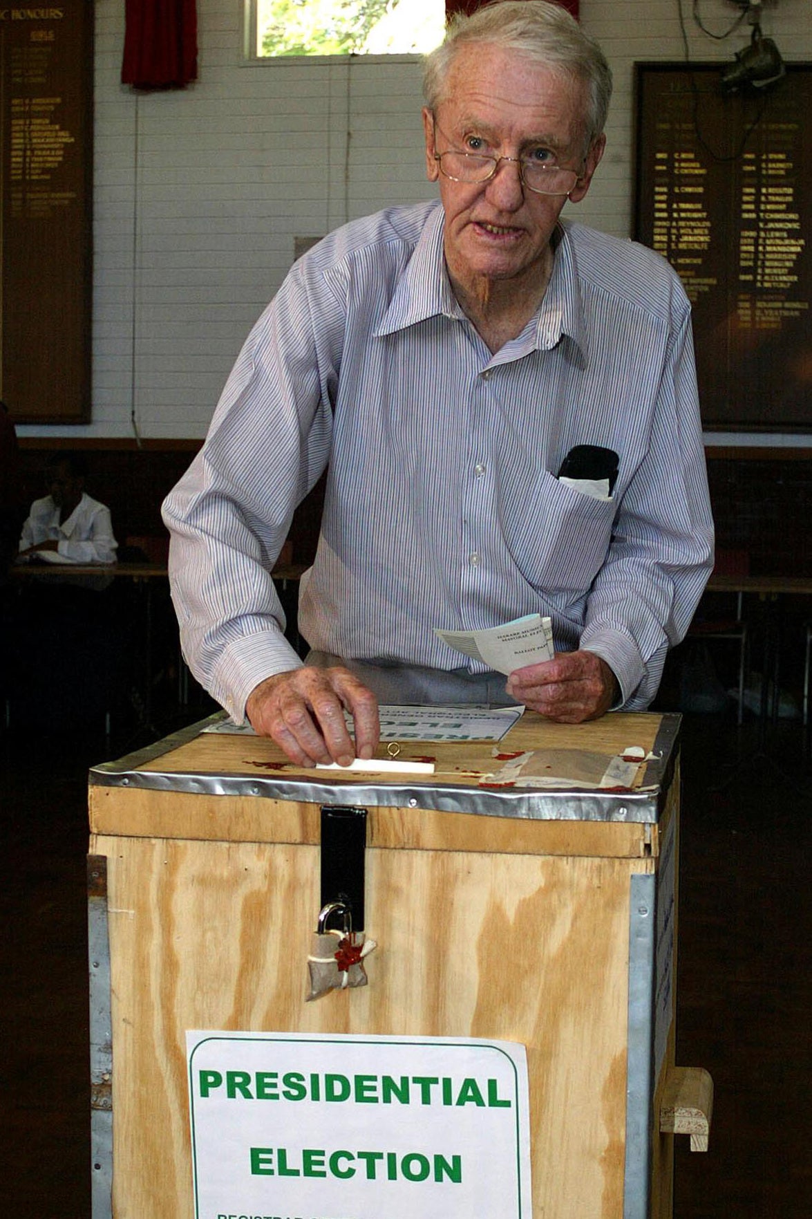 Smith casts a vote in 2002