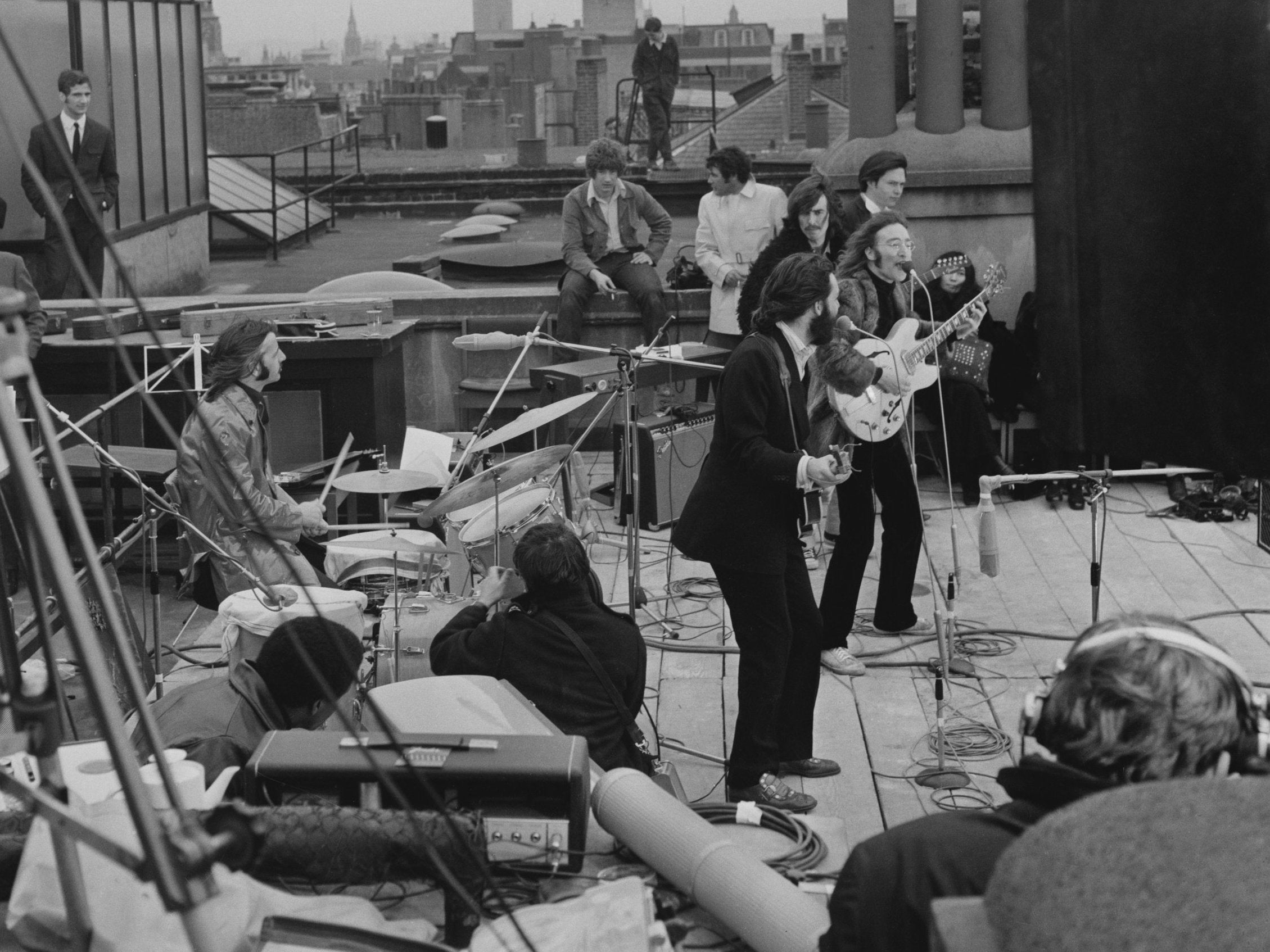 The Beatles perform at their last public concert in London, 1969