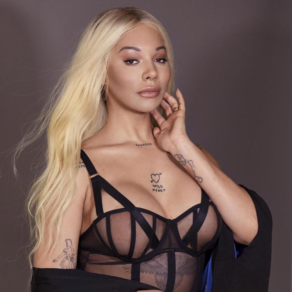 Bluebella lingerie campaign — The Independent source Adult model in a sheer black lingerie fashion campaign, illustrating editorial imagery and creator rights