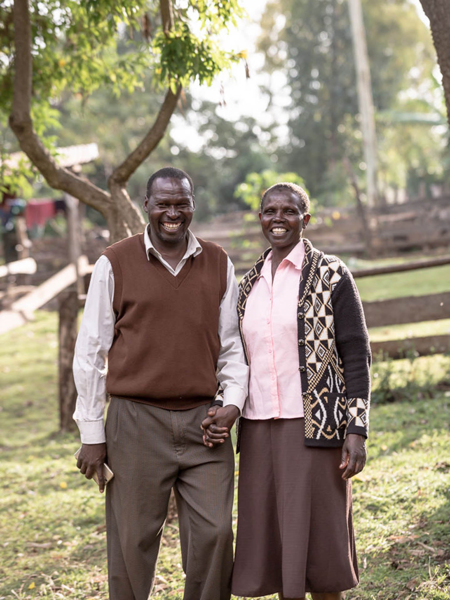 More harmony in the home: Both husbands and wives – like John and Ester Saina here – are feeling the benefits of equality. Initially men were wary of the initiative, but now they openly talk about being inspired by their wive's ability to manage money and their commitment to work and providing for their families