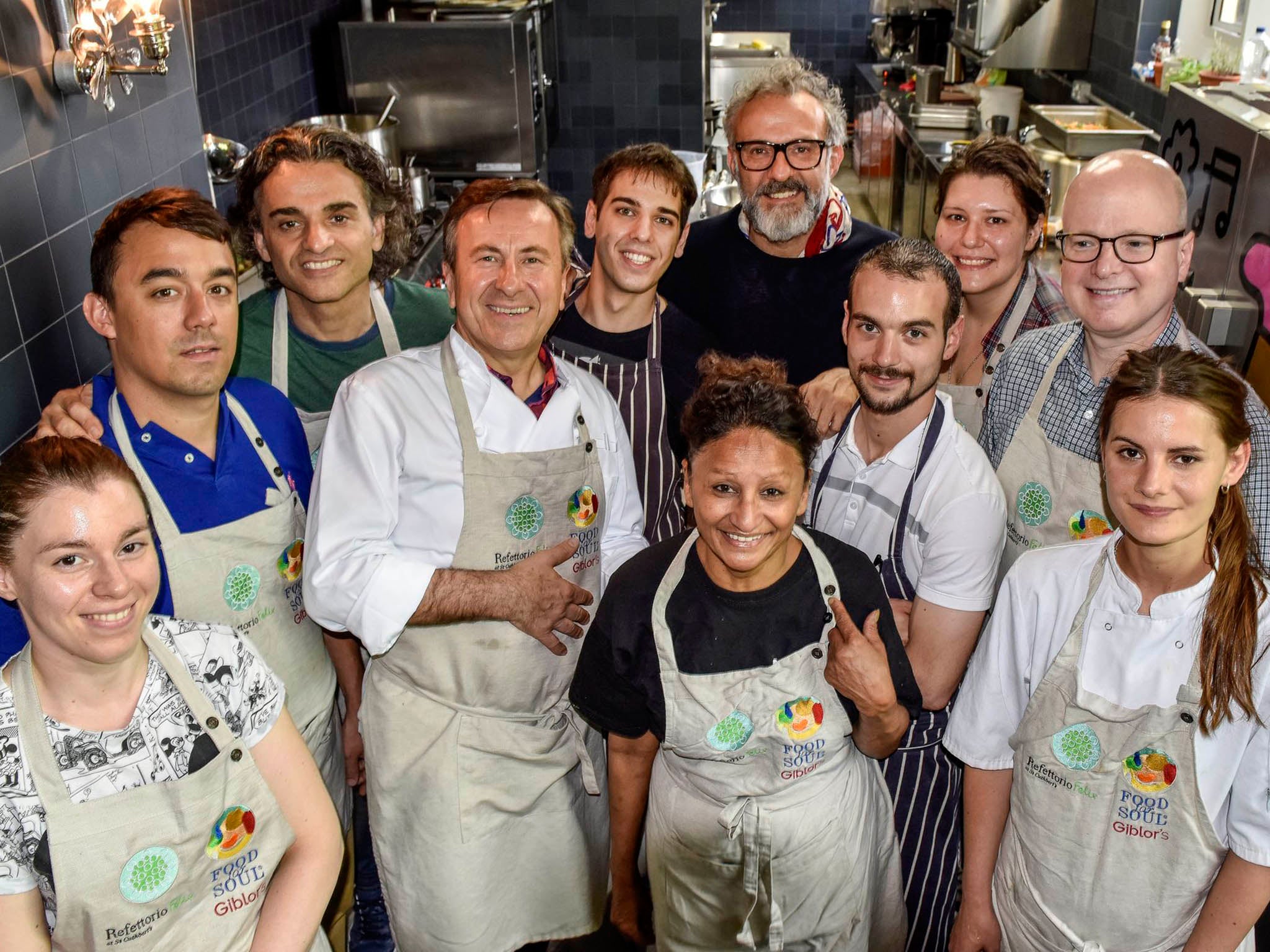 Refettorio Felix founder, Massimo Bottura, and his team serve food in west London