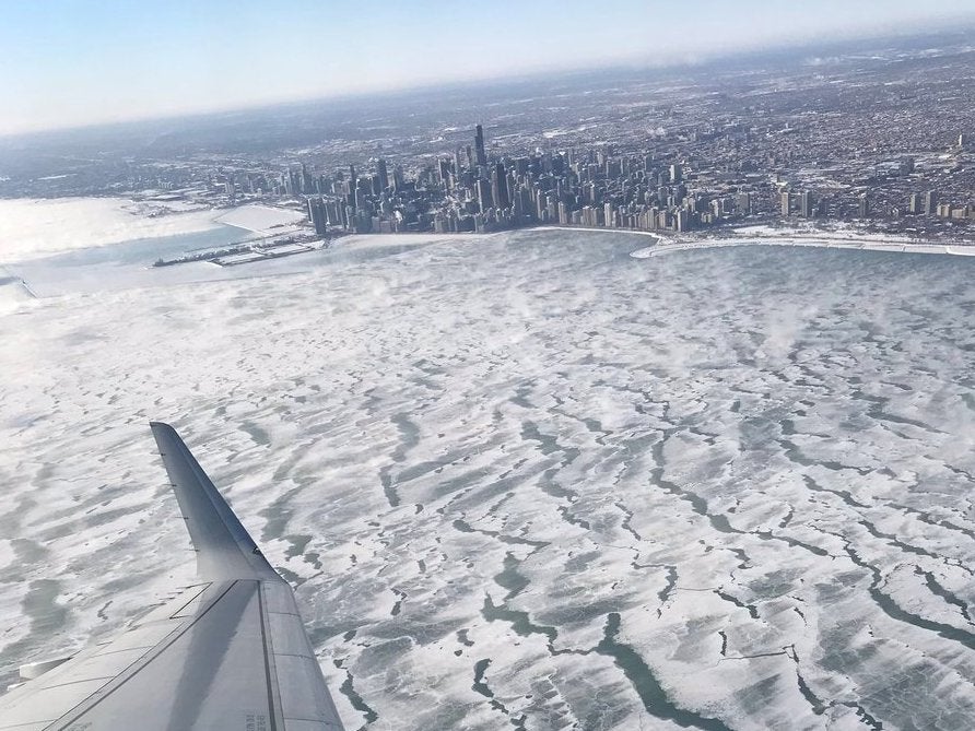 A view of frozen Lake Michigan during the polar vortex is seen from an airplane in Chicago, Illinois