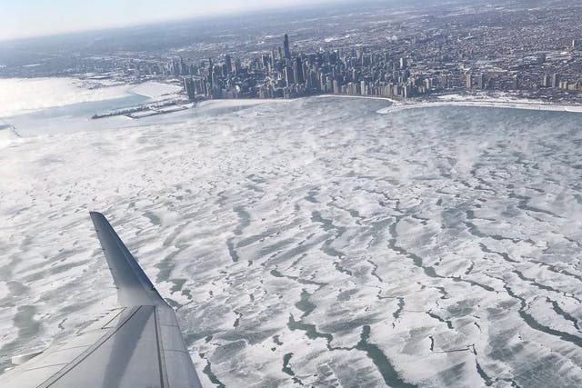 A view of frozen Lake Michigan during the polar vortex is seen from an airplane in Chicago, Illinois