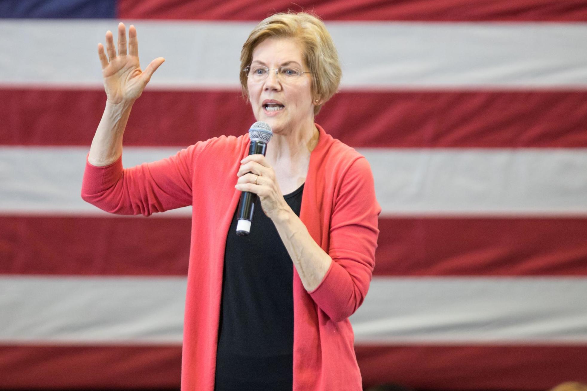 Senator Elizabeth Warren speaks during a New Hampshire organising event for her 2020 presidential exploratory committee at Manchester Community College on 12 January, 2019 in Manchester, New Hampshire.