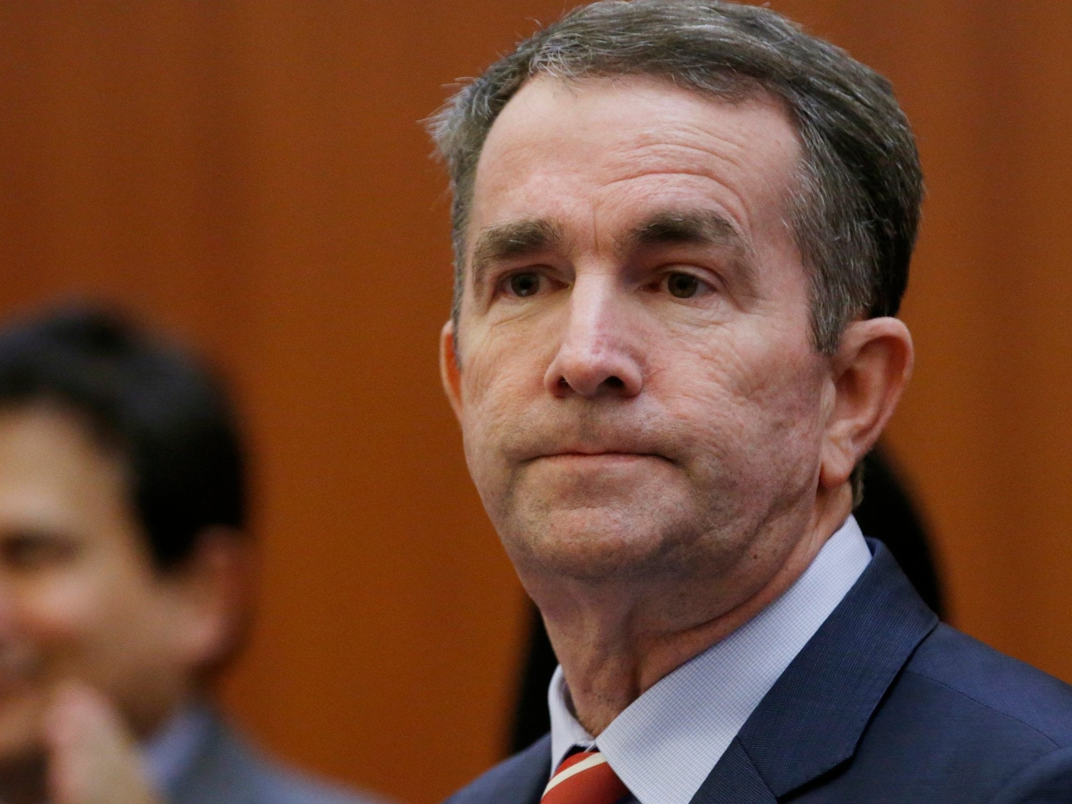 Two Democratic presidential candidates have Ralph Northam to resign.