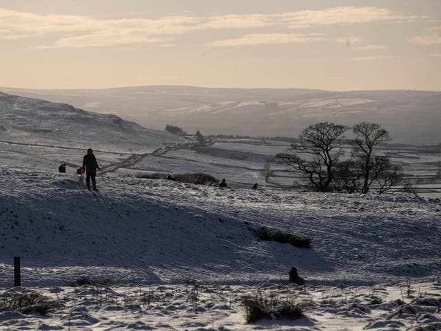 Snow blankets the hills near Ribblehead in Yorkshire