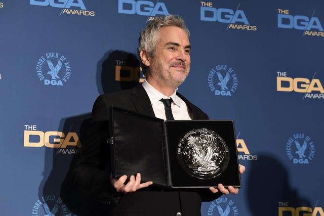 Alfonso Cuaron with his 2019 DGA award