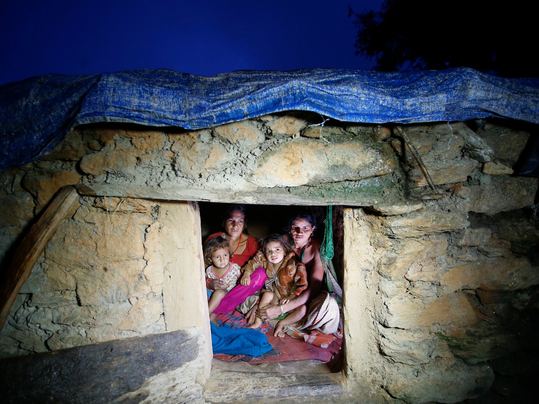 Woman in Nepal who observe the chhaupadi taboo are banished to mud or stone huts, some of them no bigger than closets