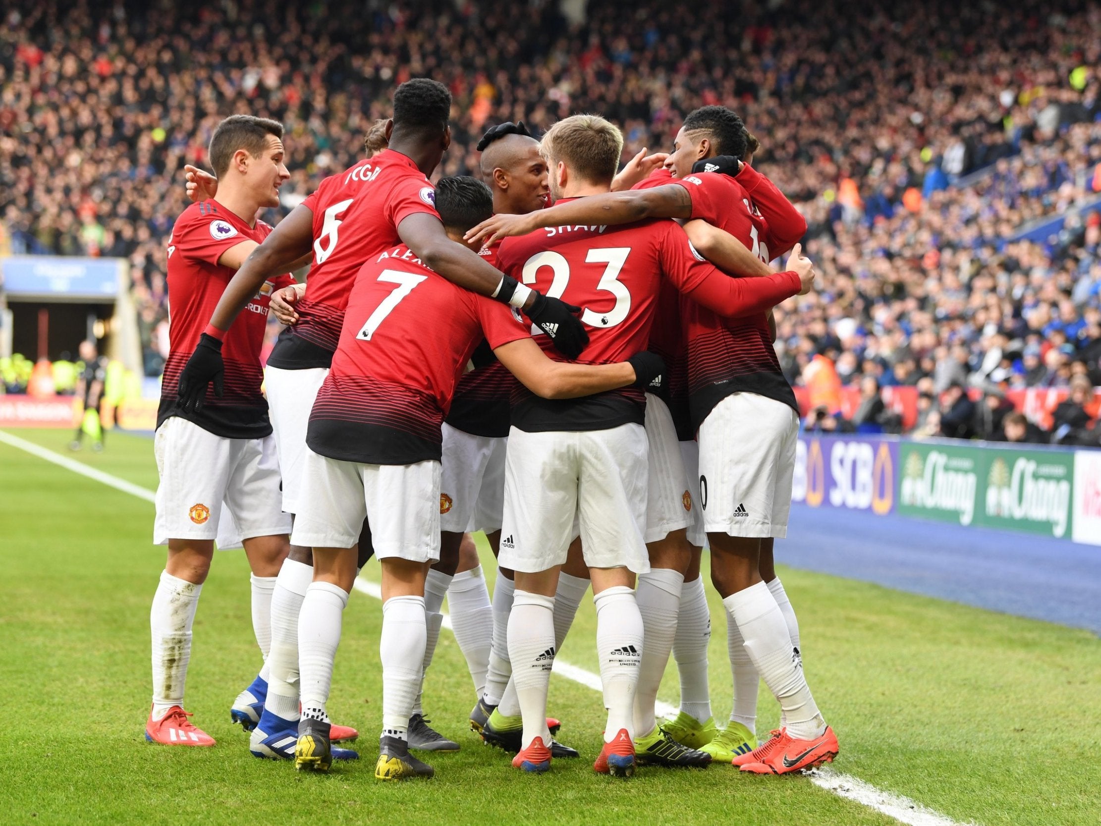 United's players celebrate after Rashford's early goal