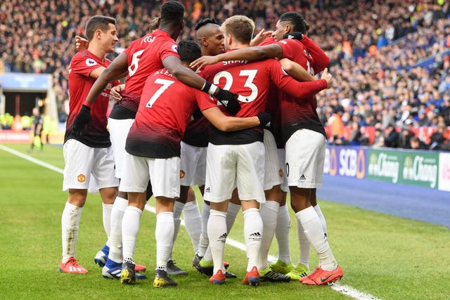 United's players celebrate after Rashford's early goal
