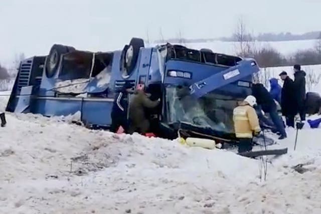 Emergency workers at the scene of the accident in the Kaluga region