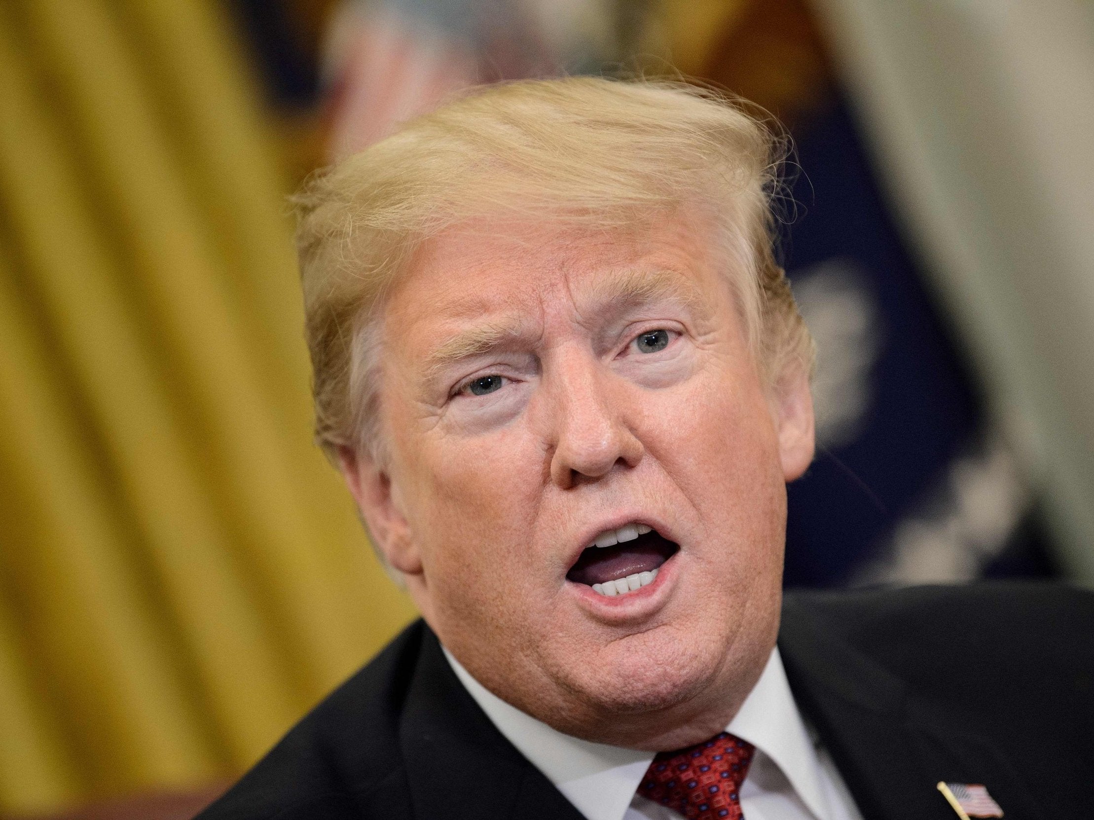 In this file photo taken on 31 January 2019, US President Donald Trump speaks before a meeting between US and Chinese officials in the Oval Office
