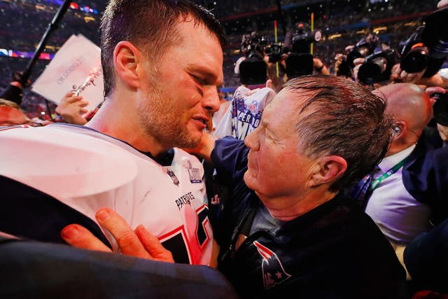 Tom Brady and Bill Belichick embrace after New England's Super Bowl win over the LA Rams