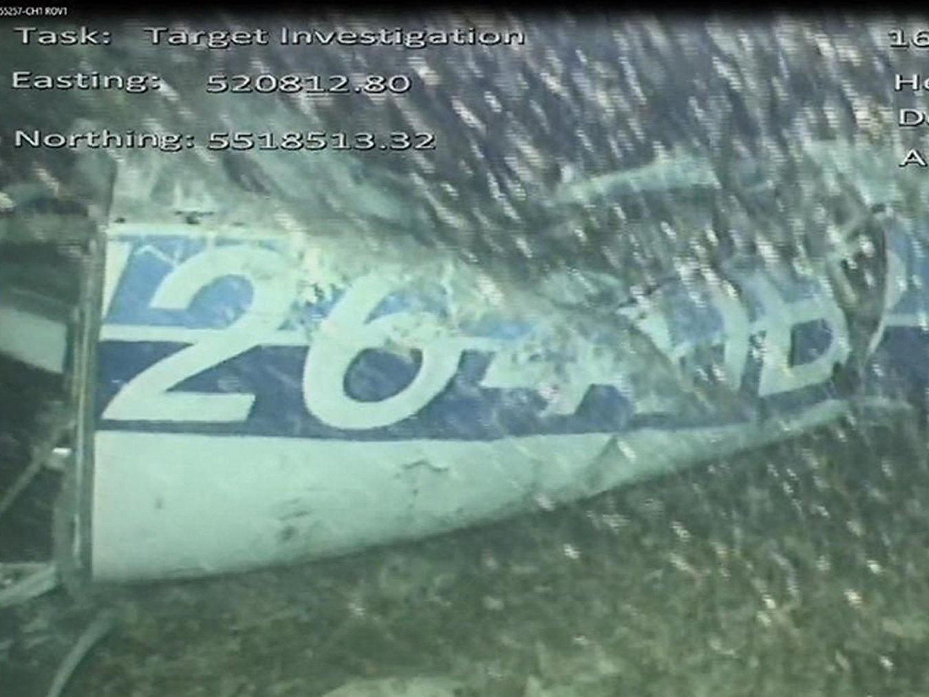 Still from handout video issued by Air Accidents Investigation Branch showing the rear left side of the fuselage, including part of the aircraft registration, in the wreckage of the plane which was carrying Sala (PAAAIB/PA)