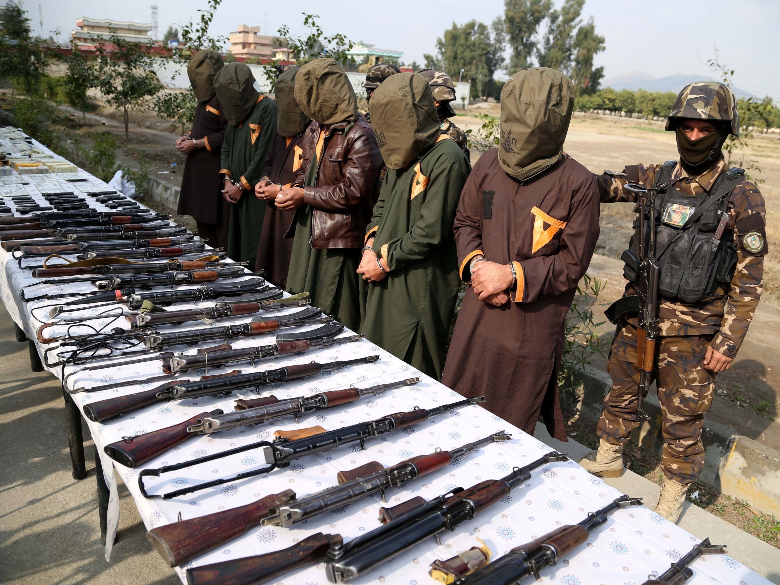 Militants accused of planning attacks on government and security forces line up after their arrest in Jalalabad, Afghanistan, on 23 January 2019. According to reports the six suspected militants, two of them Taliban and four of them from IS, were arrested when Afghan security forces carried out a number of operations targeting militants and criminals in different parts of the country