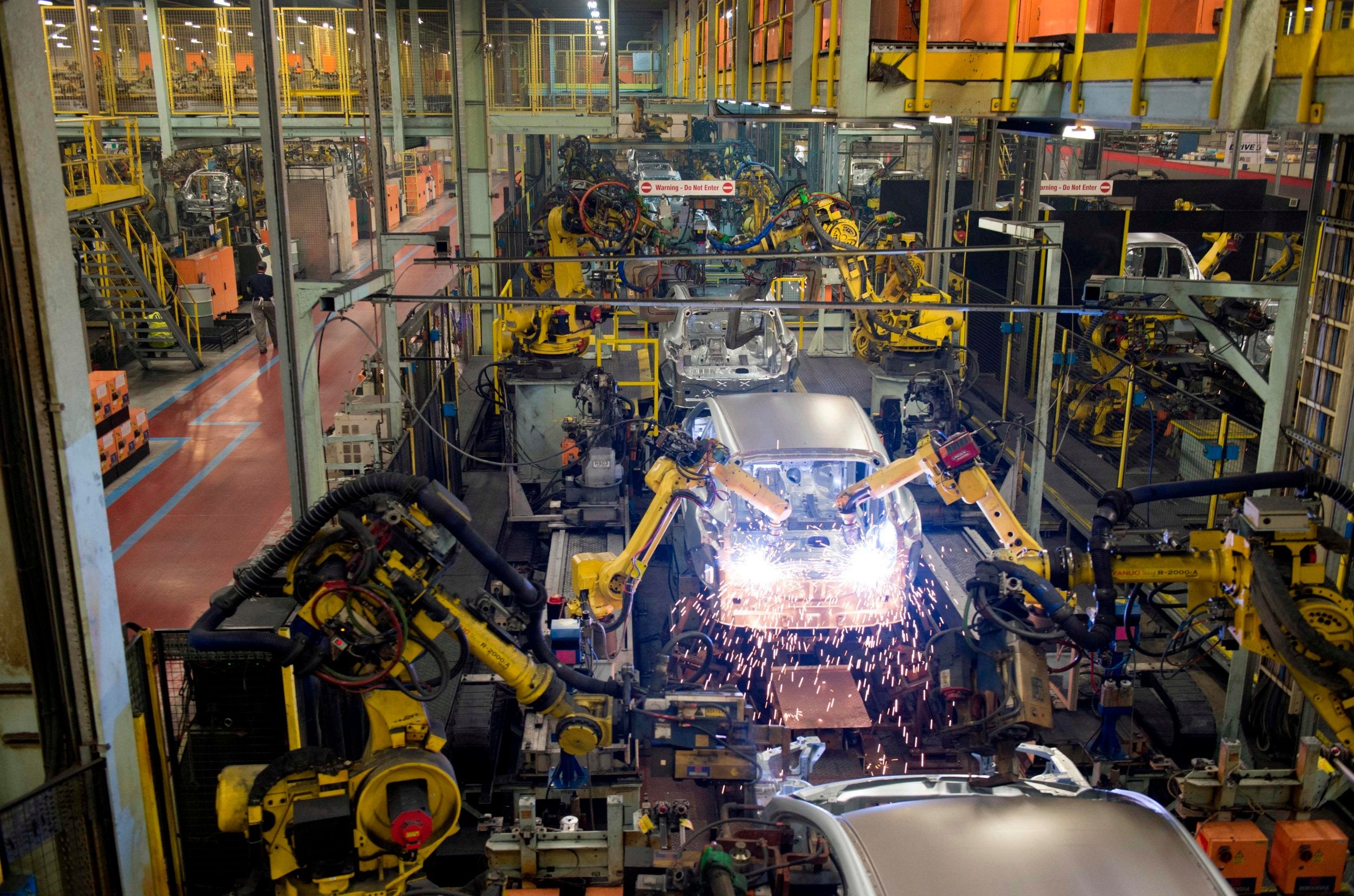 Robots at a Nissan plant... they are set to push far beyond manufacturing