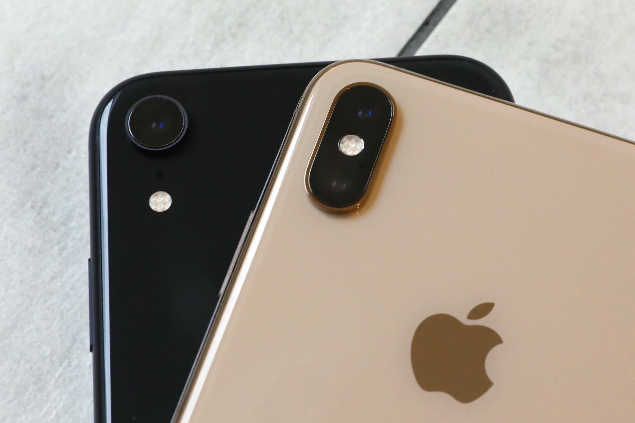 This Oct. 22, 2018, file photo shows the iPhone XR, left, that has a single lens, and the iPhone XS Max that has two lenses, in New York