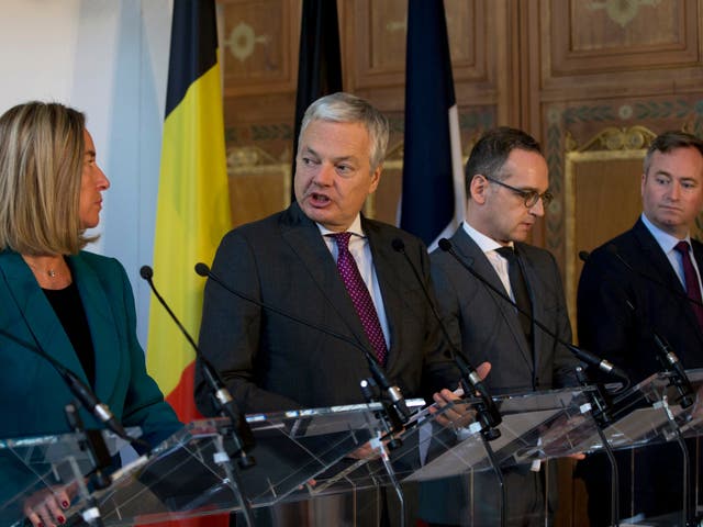 Officials from EU members of the UN Security Council discuss Iran at a news conference in Brussels