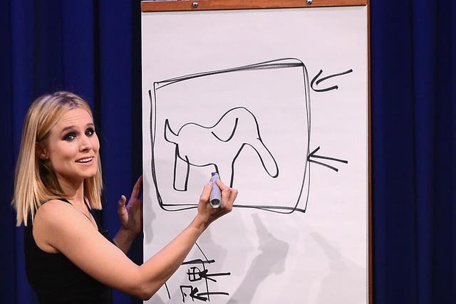 Kristen Bell plays a game of Pictionary at Rockefeller Center on 10 March, 2014 in New York City