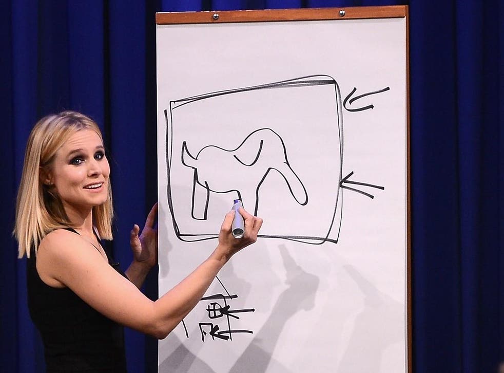 Kristen Bell plays a game of Pictionary at Rockefeller Center on 10 March, 2014 in New York City