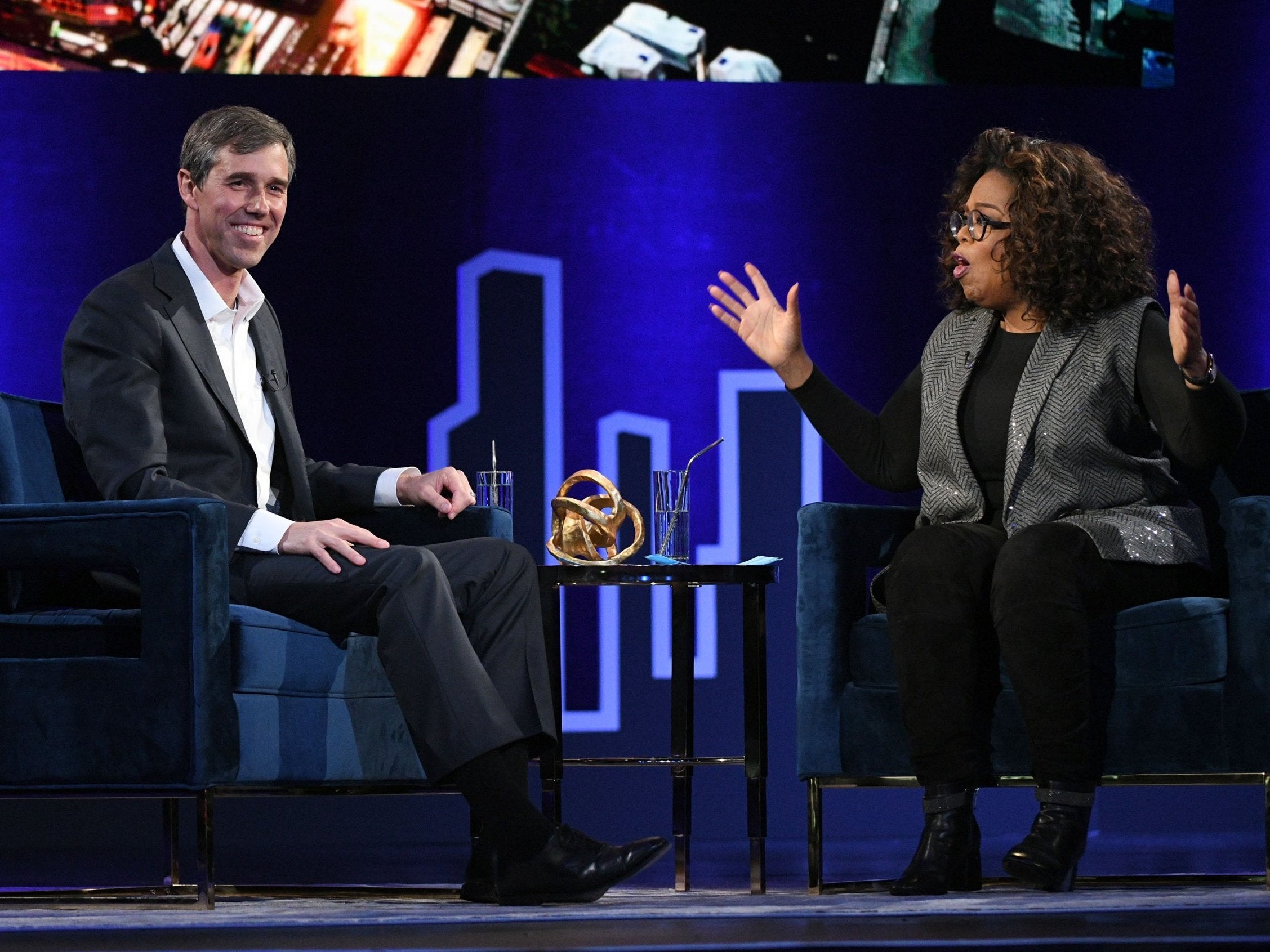 Beto O'Rourke and Oprah Winfrey speak onstage during Oprah's SuperSoul Conversations