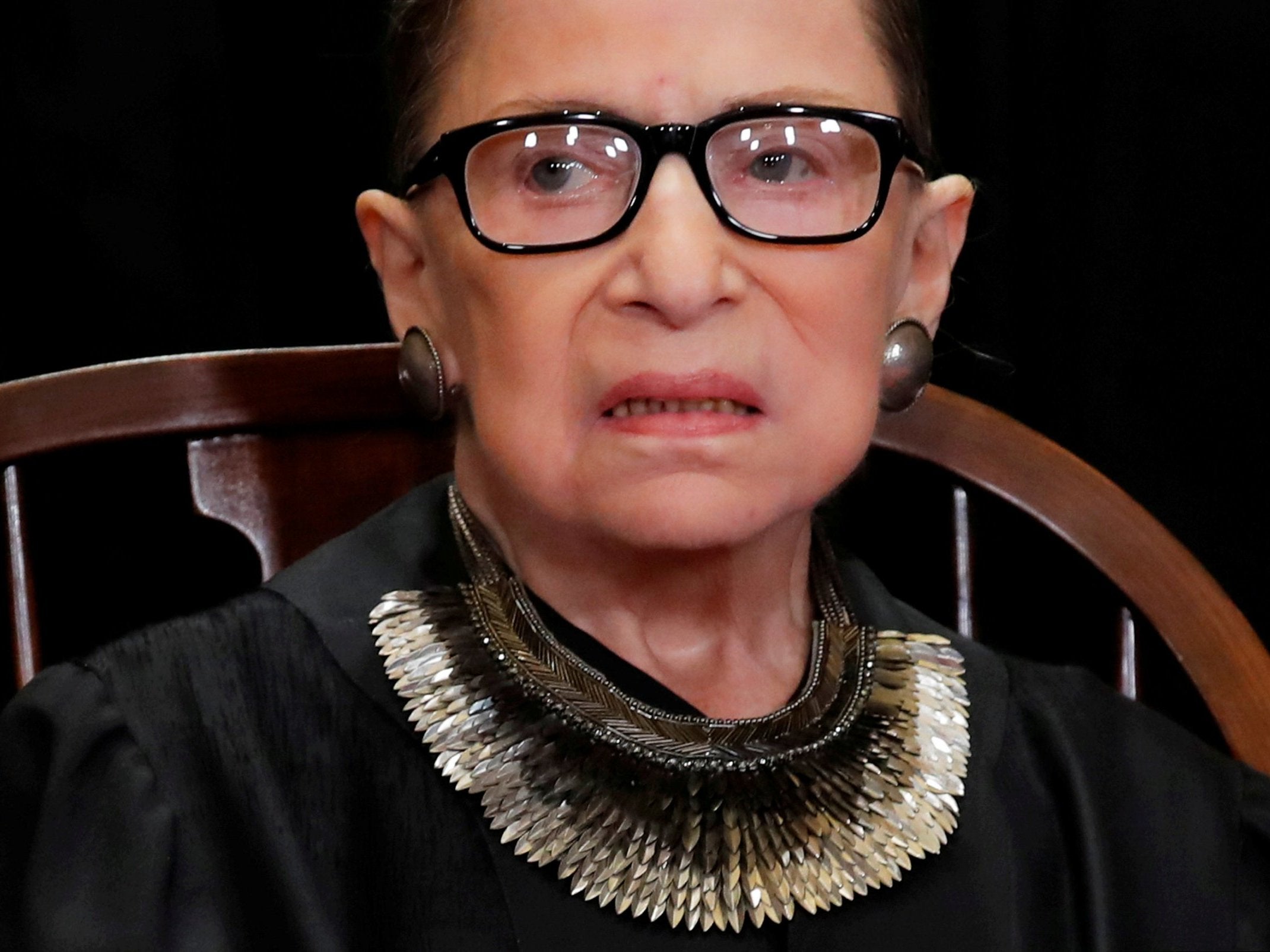 US Supreme Court Associate Justice Ruth Bader Ginsburg is seen during a group portrait session for the new full court