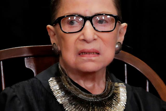 US Supreme Court Associate Justice Ruth Bader Ginsburg is seen during a group portrait session for the new full court