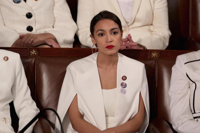 Rep. Alexandria Ocasio-Cortez (D-NY) watches President Donald Trump's State of the Union address in the chamber of the U.S. House of Representatives at the U.S. Capitol Building on February 5, 2019 in Washington, DC.