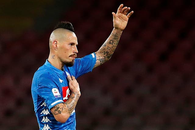 Napoli's Marek Hamsik reacts as he walks off the pitch
