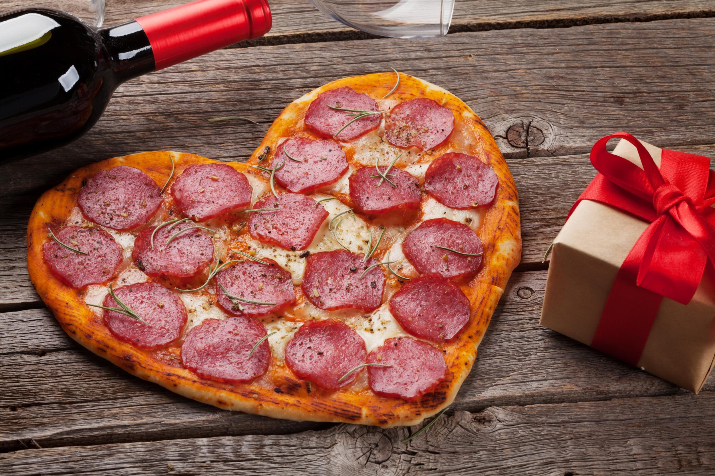 Heart-shaped pizza is perfect for Valentine’s Day (Stock)