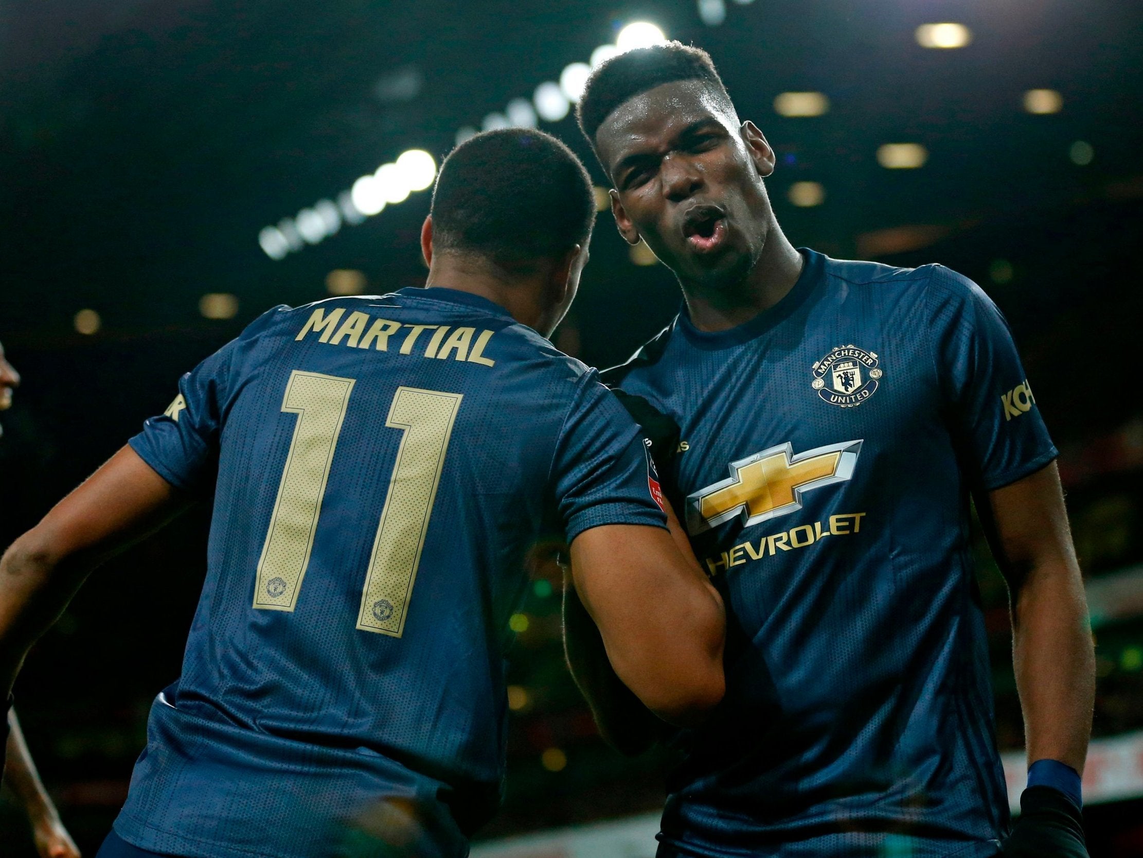 Anthony Martial and Paul Pogba celebrate vs Arsenal (AFP/Getty )