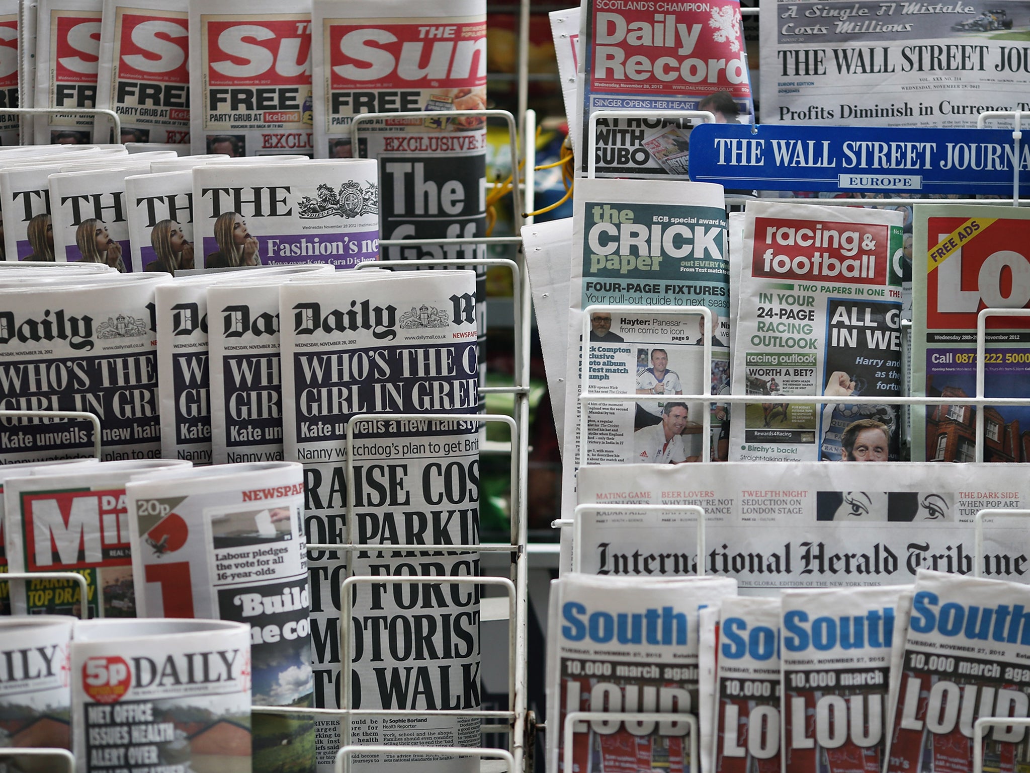 Traditional newsstand in 2012: print media is dying but people will need to get used to paying for online information