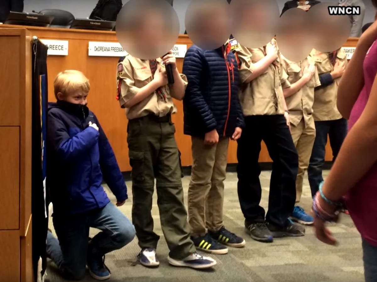 US boy scout takes a knee during Pledge of Allegiance in protest against racism