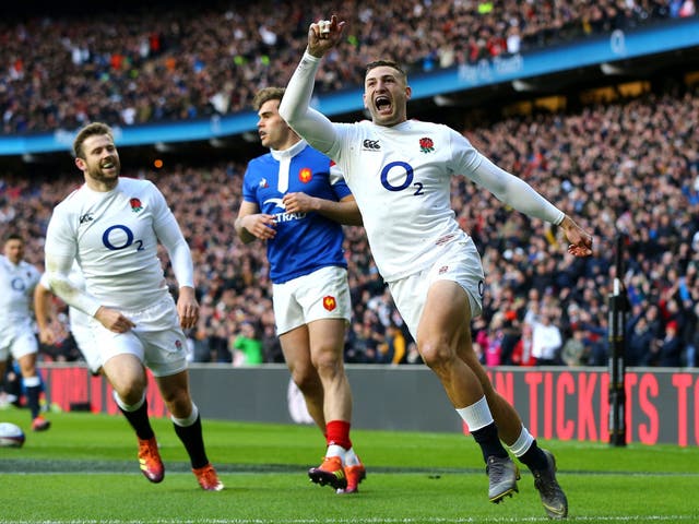England's Jonny May celebrates scoring