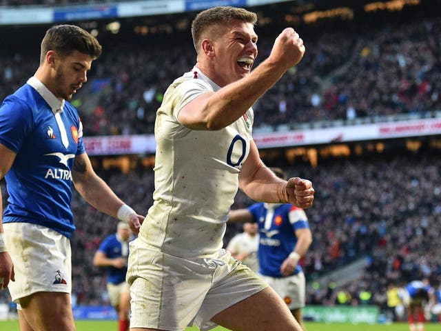 Owen Farrell celebrates scoring England's sixth and final try against France