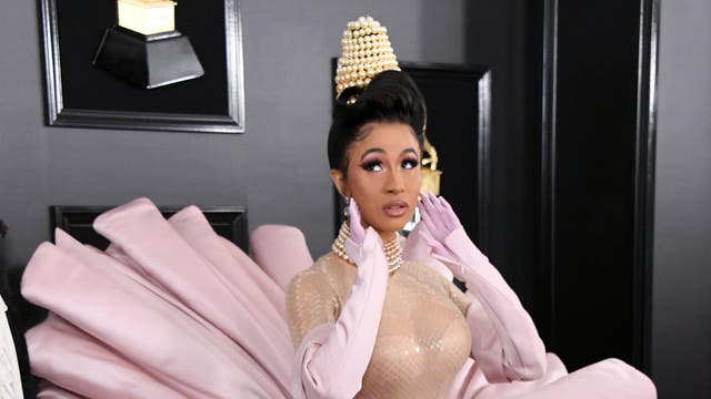 The performer accessorised her 24-year-old Mugler dress, which Twitter users compared to looking like a clam, with a swirl of pearls structured into a Boticelli-beehive atop her head. The headpiece matched the stacked pearl necklace wrapped around the singer’s neck, as well as the pearl drop-waist belt on her vintage dress.