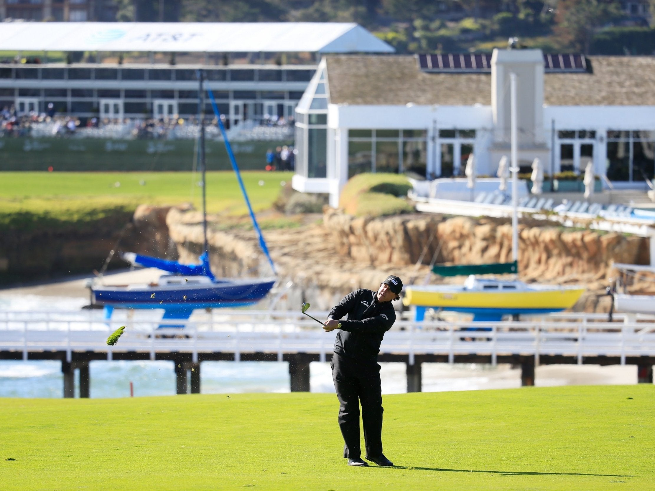 Phil Mickelson leads the Pebble Beach Pro-Am by three shots heading into a delayed fifth day