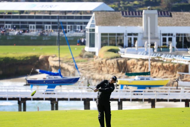 Phil Mickelson leads the Pebble Beach Pro-Am by three shots heading into a delayed fifth day