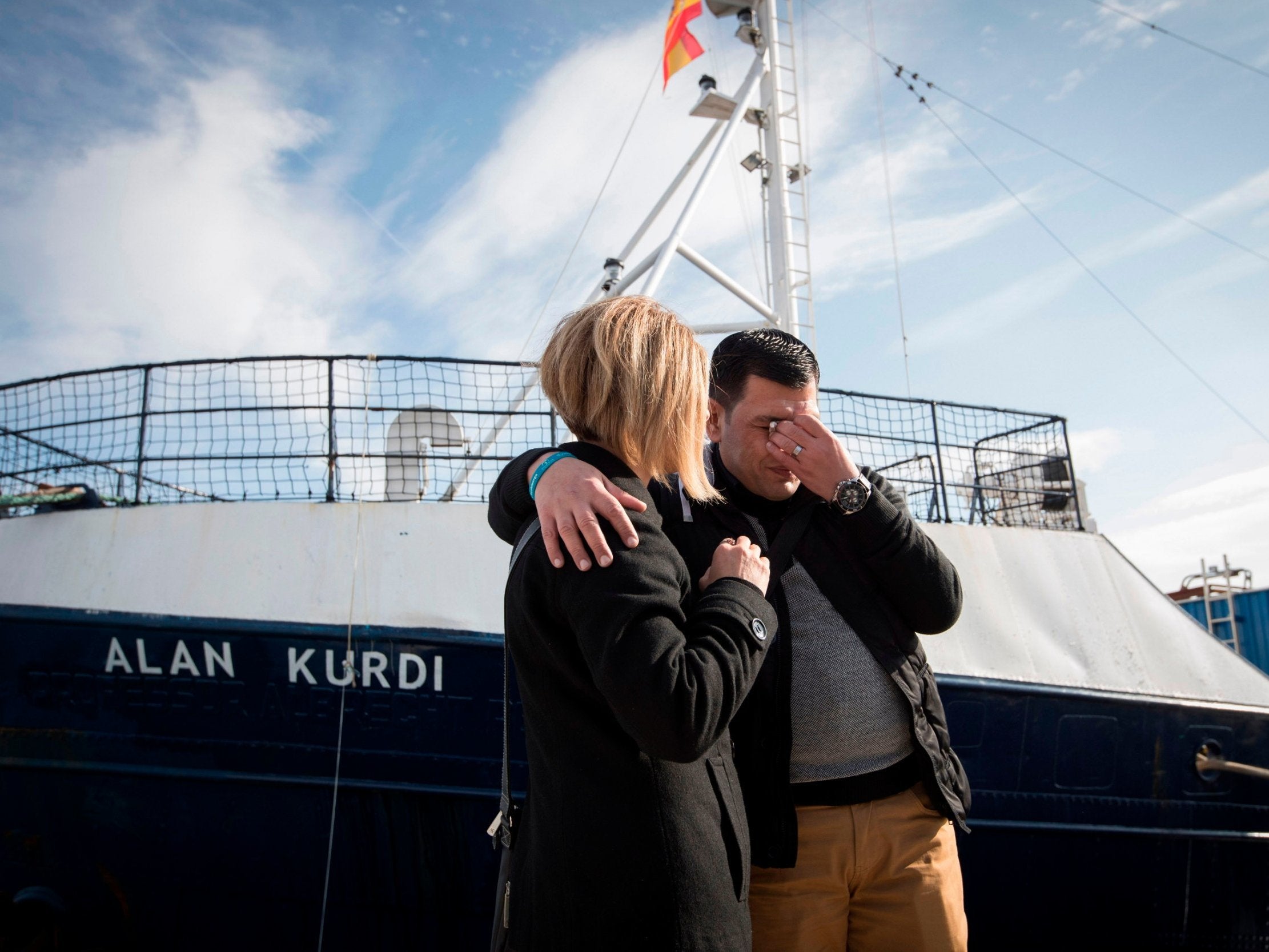 Abdullah Kurdi and his sister Tima in front of the Sea-Eye rescue ship in Mallorca