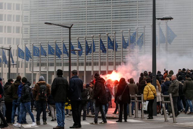 Anti-immigration protesters demonstrate outside the European Commission